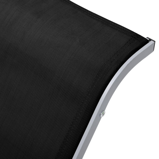 Bain de soleil en textilène noir et aluminium
