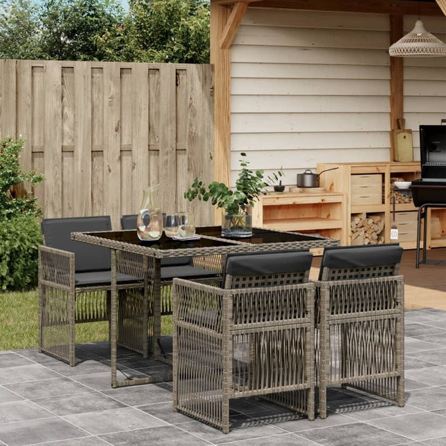 Table et chaises de jardin 4 places gain de place en résine tressée grise avec coussins